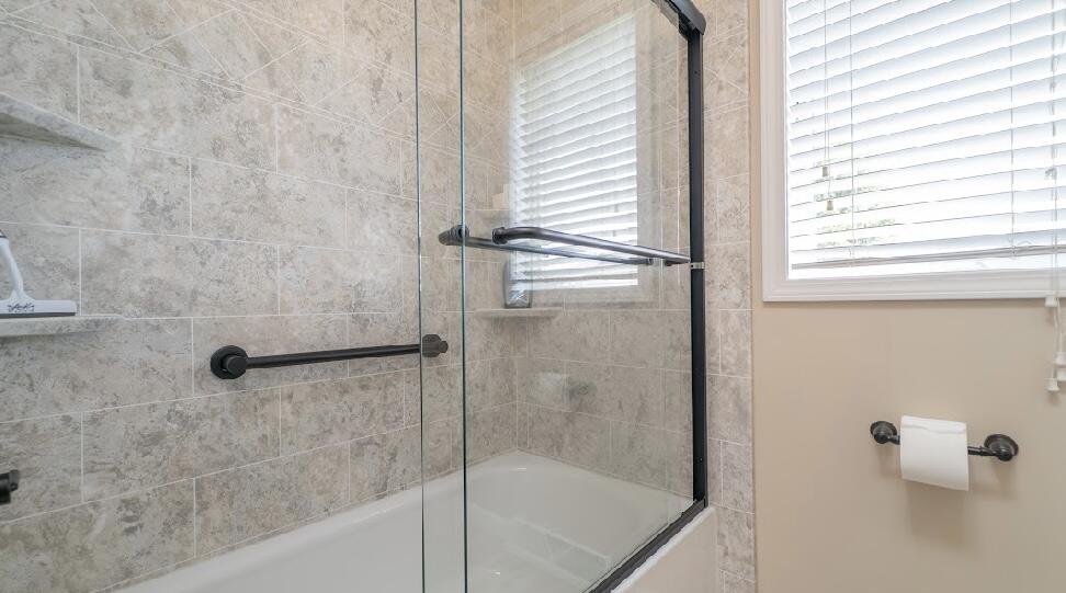 9166 Maple Court St. John, IN 46373 - Photo 18 of 40 a bathroom with a shower
