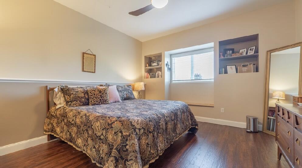 9166 Maple Court St. John, IN 46373 - Photo 28 of 40 a bedroom with a bed and a flat screen tv