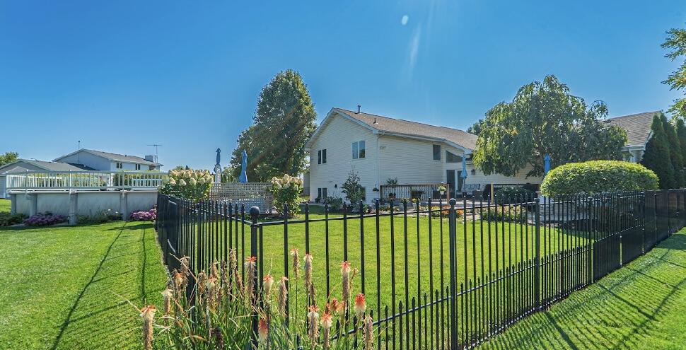 9166 Maple Court St. John, IN 46373 - Photo 33 of 40 a view of a house with swimming pool and sitting area