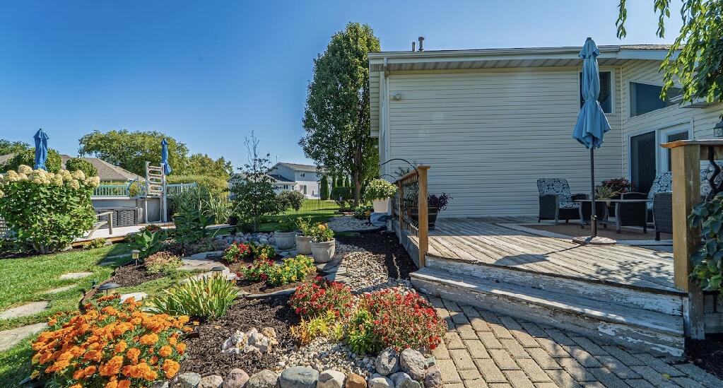 9166 Maple Court St. John, IN 46373 - Photo 35 of 40 a view of a backyard with sitting area