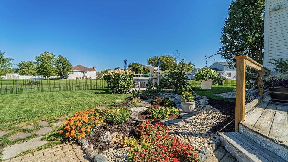 9166 Maple Court St. John, IN 46373 - Photo 36 of 40 a view of backyard with seating area and green space