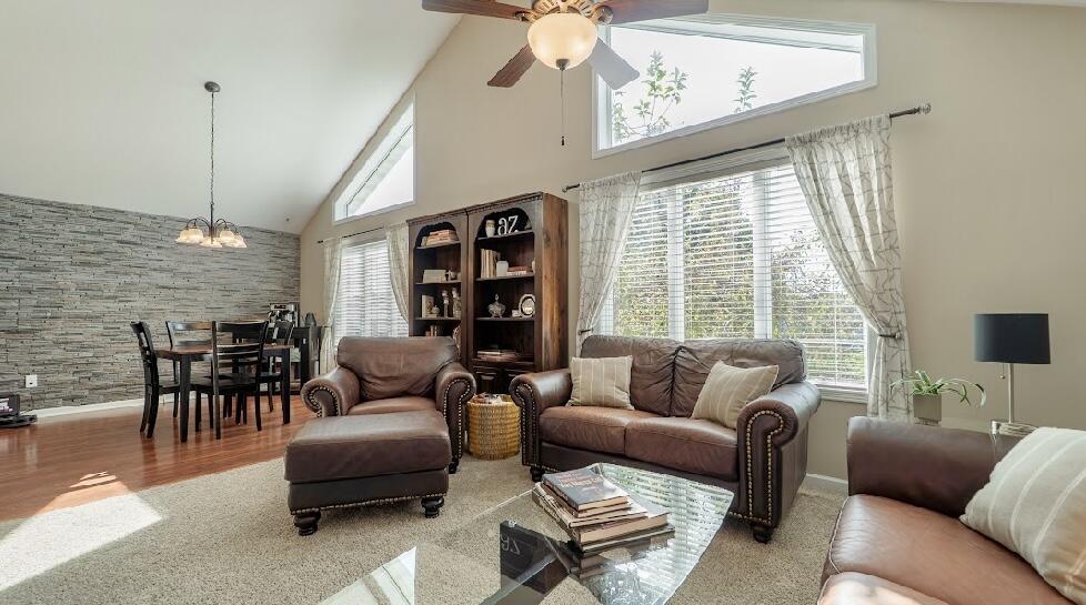 9166 Maple Court St. John, IN 46373 - Photo 9 of 40 a living room with furniture and a large window