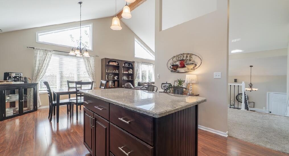 9166 Maple Court St. John, IN 46373 - Photo 10 of 40 a kitchen with a sink a counter top space and a window