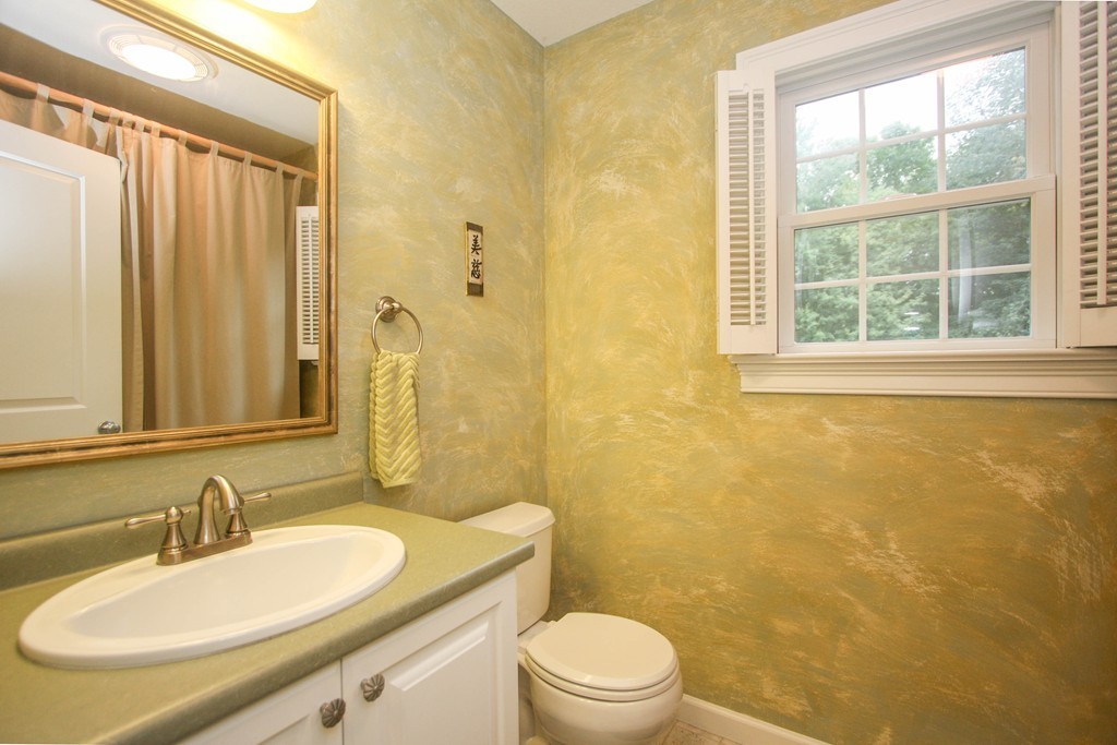 49 Chester Street West Springfield, MA 01089 - Photo 14 of 25 a bathroom with a granite countertop sink toilet and shower