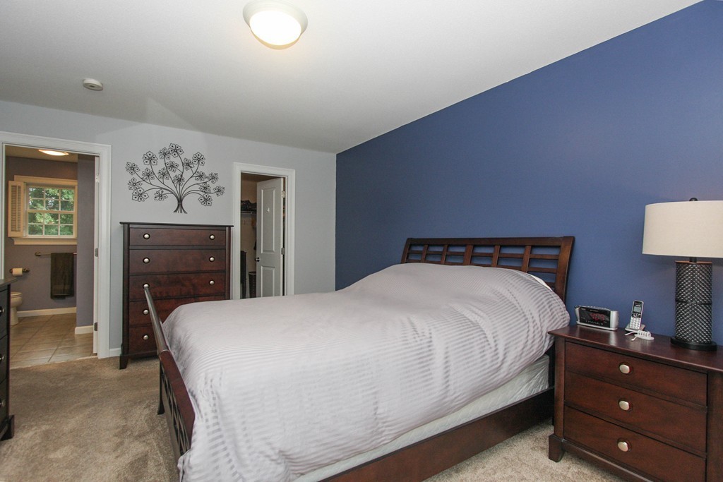 49 Chester Street West Springfield, MA 01089 - Photo 16 of 25 a bedroom with a bed and a dresser