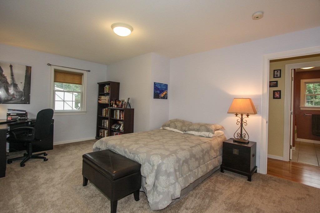 49 Chester Street West Springfield, MA 01089 - Photo 19 of 25 a bedroom with a bed and a window