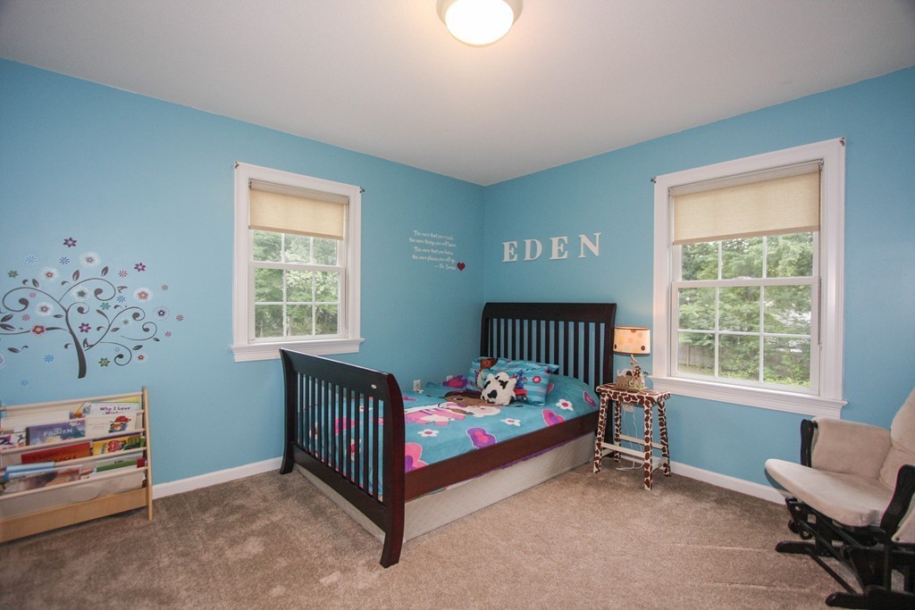 49 Chester Street West Springfield, MA 01089 - Photo 21 of 25 a bedroom with a bed and a window