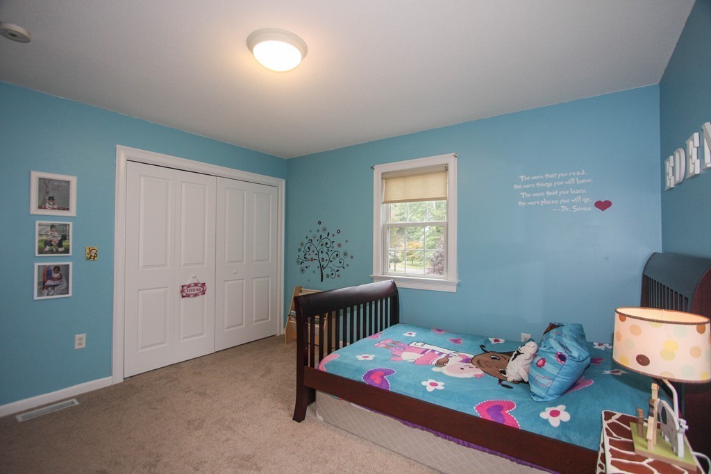 49 Chester Street West Springfield, MA 01089 - Photo 22 of 25 a bedroom with furniture and a window