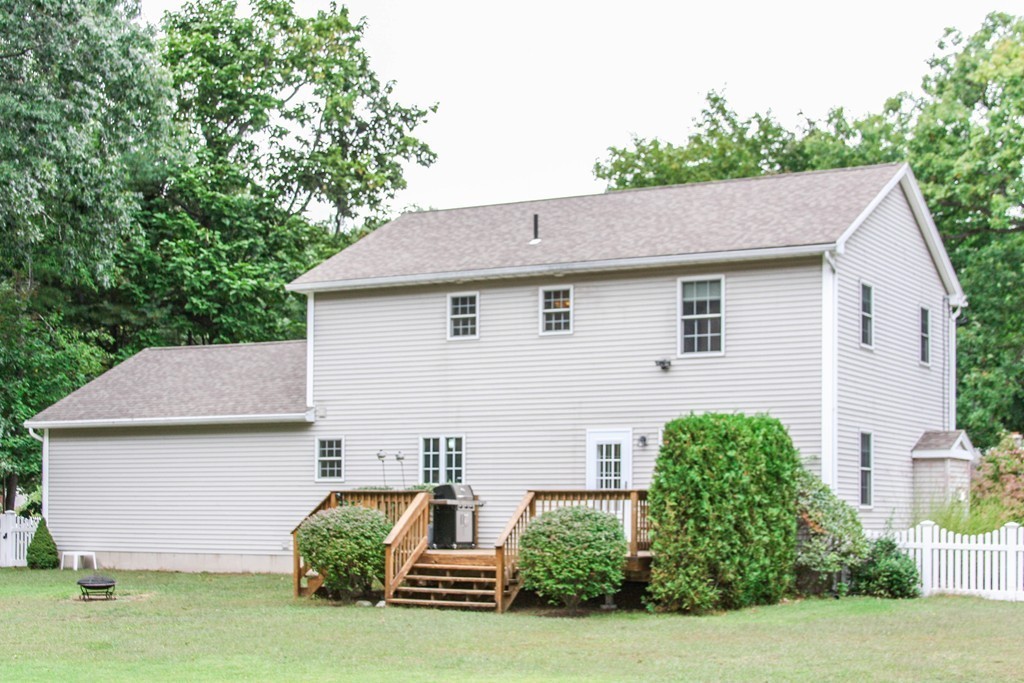49 Chester Street West Springfield, MA 01089 - Photo 24 of 25 a view of a house with a yard and plants