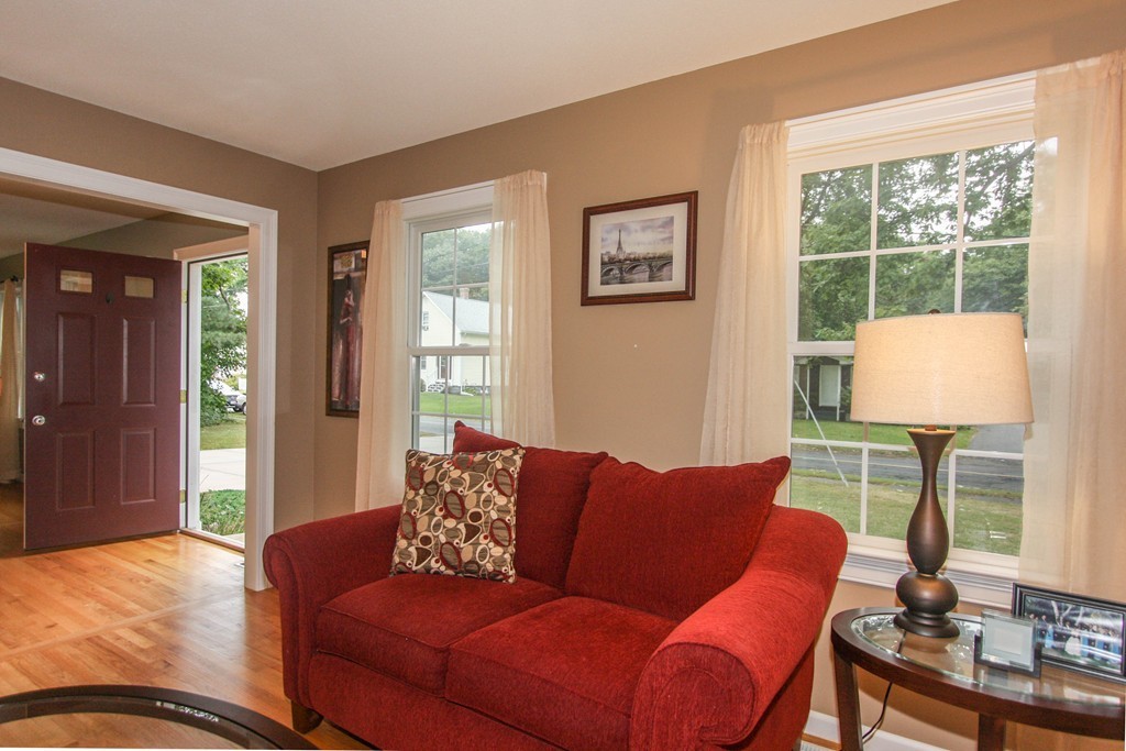 49 Chester Street West Springfield, MA 01089 - Photo 3 of 25 a living room with furniture and a window