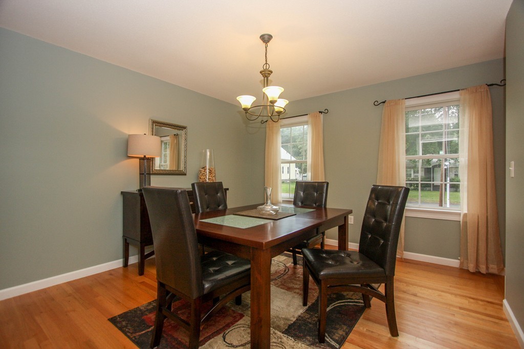 49 Chester Street West Springfield, MA 01089 - Photo 8 of 25 a view of a dining room with furniture and wooden floor