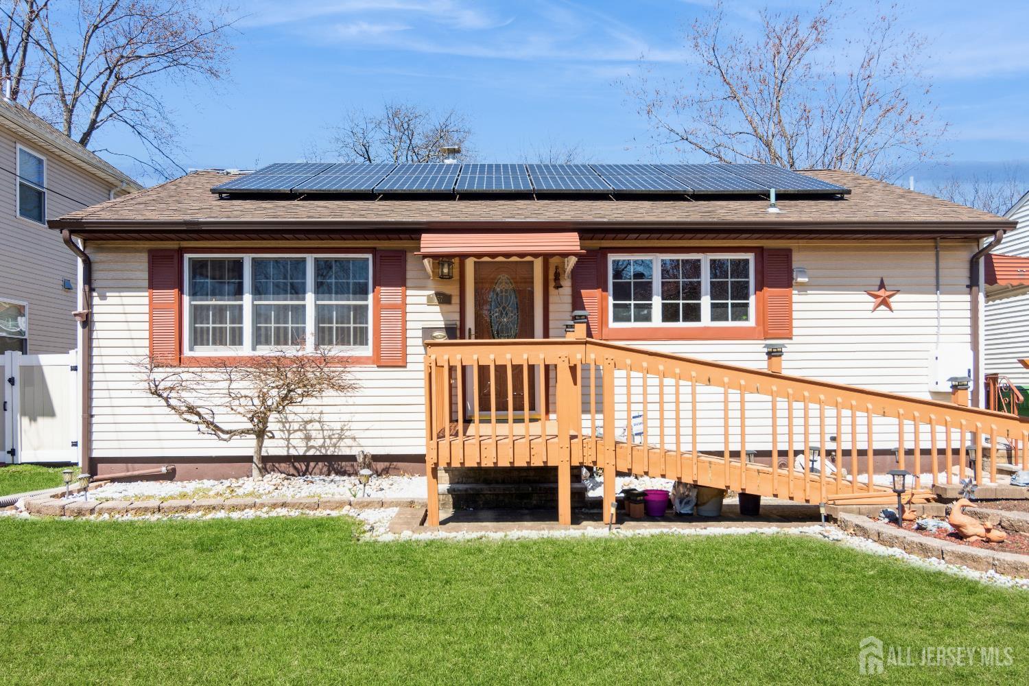 157 Orange Street Edison, NJ 08817 - Photo 1 of 19 a front view of a house with a yard