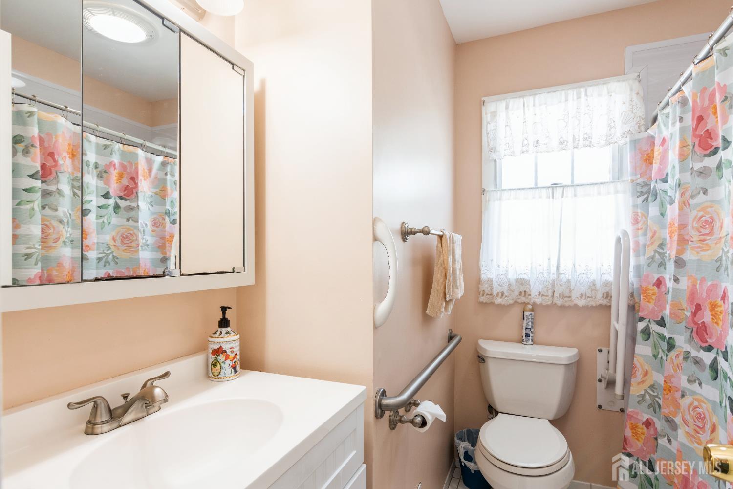 157 Orange Street Edison, NJ 08817 - Photo 11 of 19 a bathroom with a sink toilet and shower