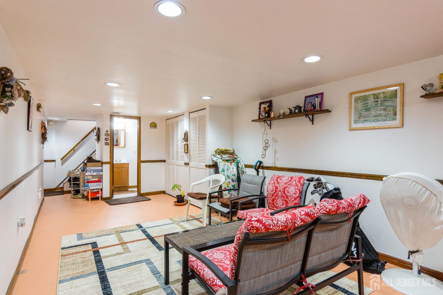157 Orange Street Edison, NJ 08817 - Photo 13 of 19 a living room with furniture and wooden floor