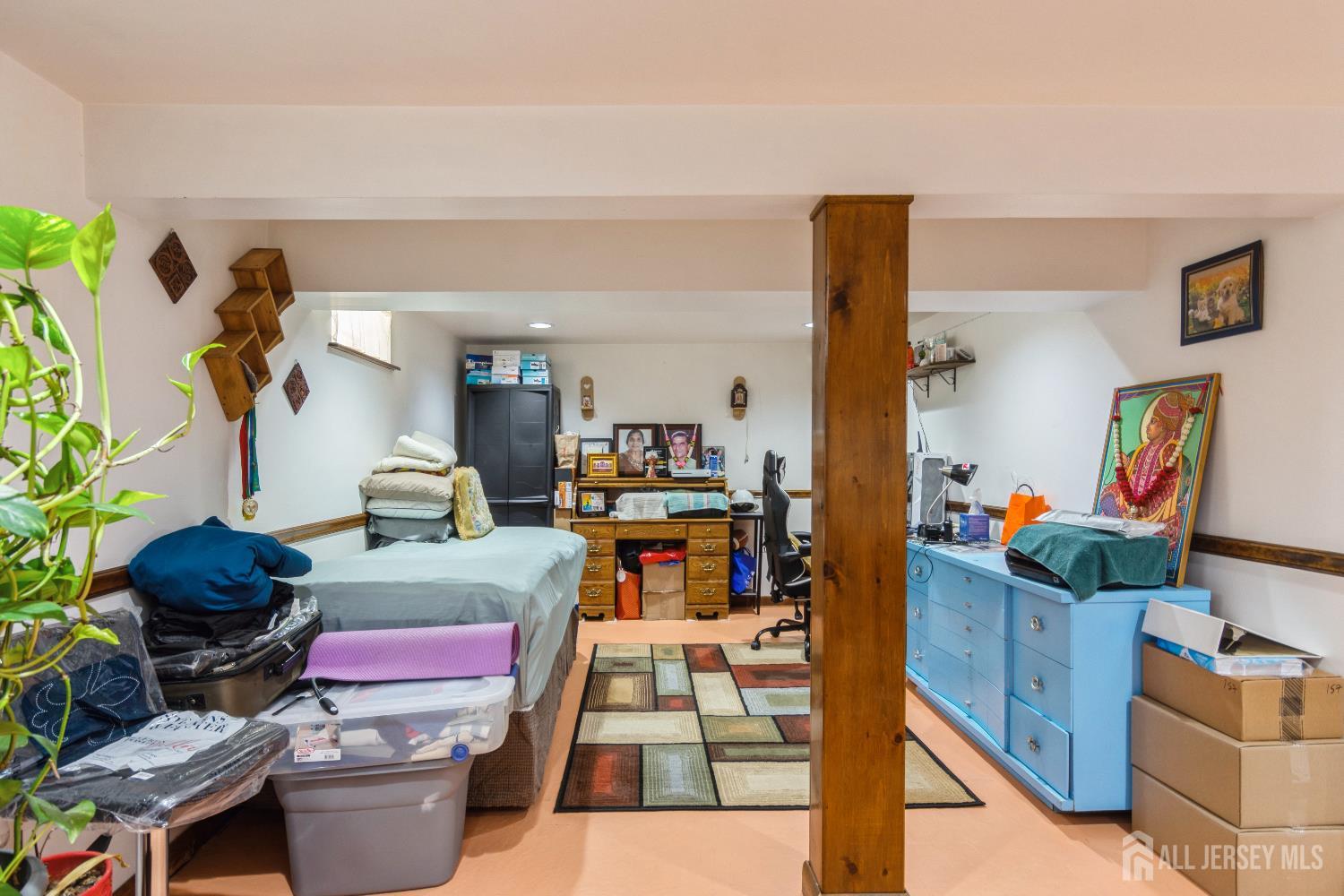 157 Orange Street Edison, NJ 08817 - Photo 14 of 19 a living room with furniture and a couch
