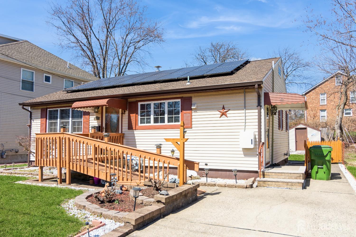 157 Orange Street Edison, NJ 08817 - Photo 2 of 19 a front view of a house with a yard
