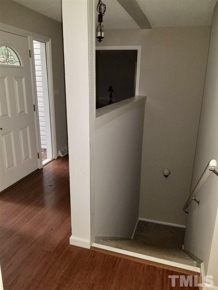 6420 Rockrest Court Raleigh, NC 27612 - Photo 2 of 22 Entry foyer and basement access
