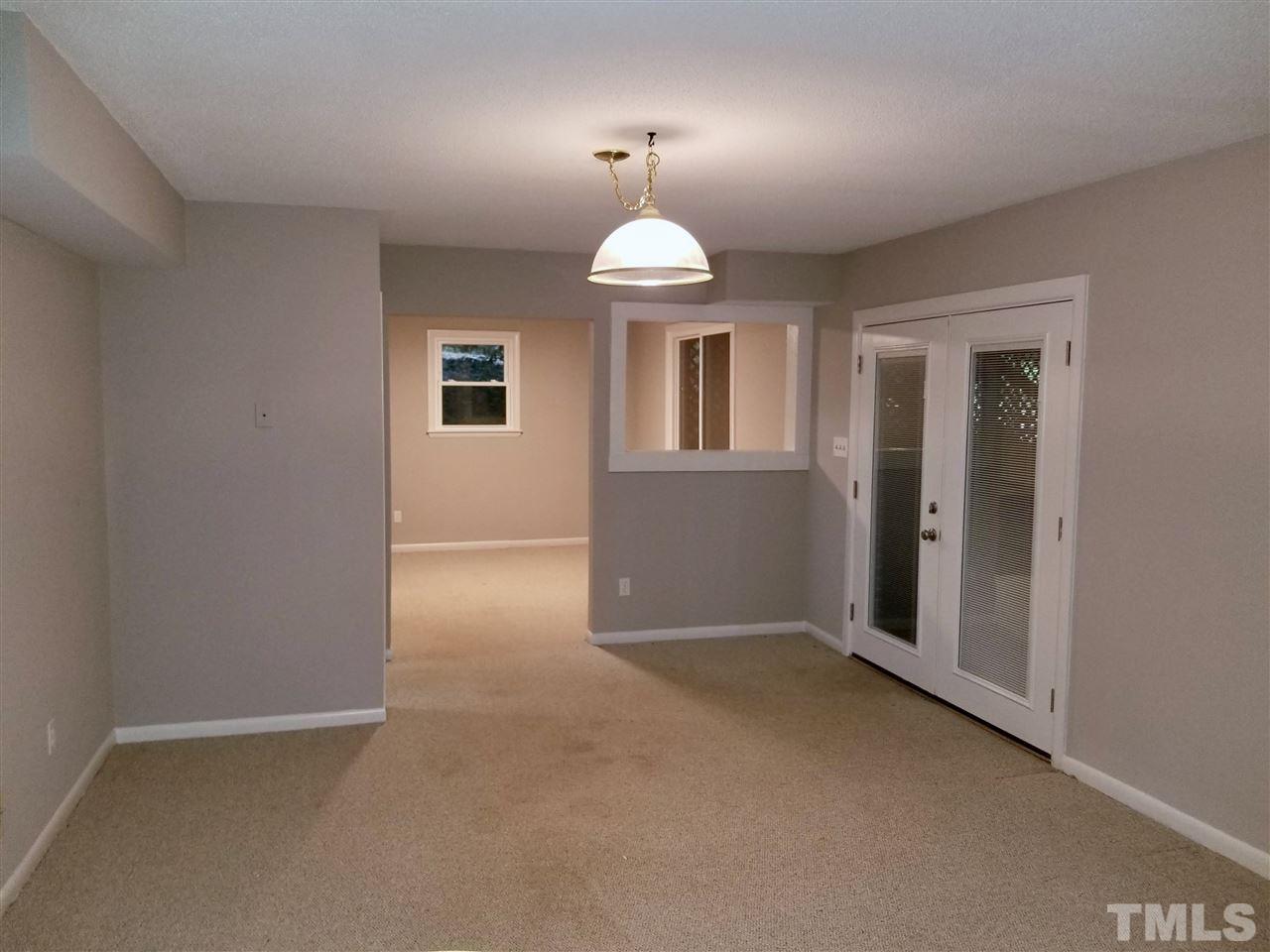 6420 Rockrest Court Raleigh, NC 27612 - Photo 16 of 22 Another view of the basement living area, access and 'office' space