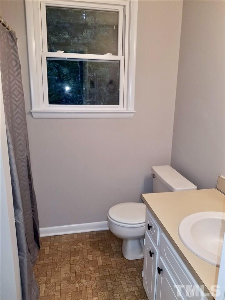 6420 Rockrest Court Raleigh, NC 27612 - Photo 17 of 22 Basement level full bathroom w/ stand-up shower