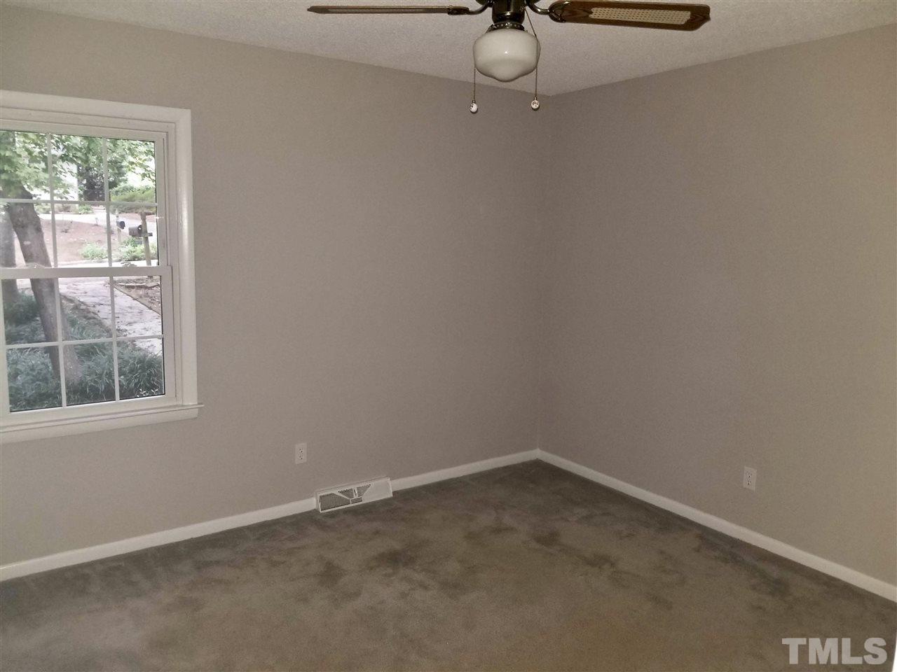 6420 Rockrest Court Raleigh, NC 27612 - Photo 7 of 22 Extra bedroom overlooking front yard w/ ceiling fan