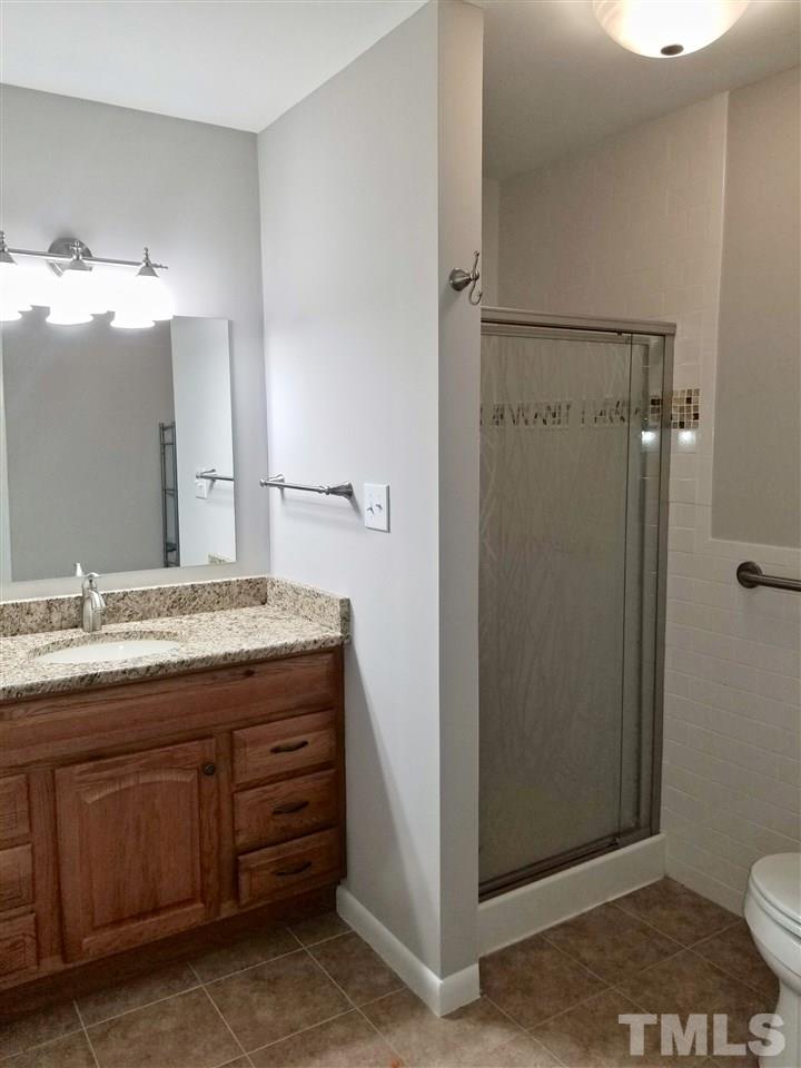 6420 Rockrest Court Raleigh, NC 27612 - Photo 9 of 22 Updated master bathroom w/ walk-in closet