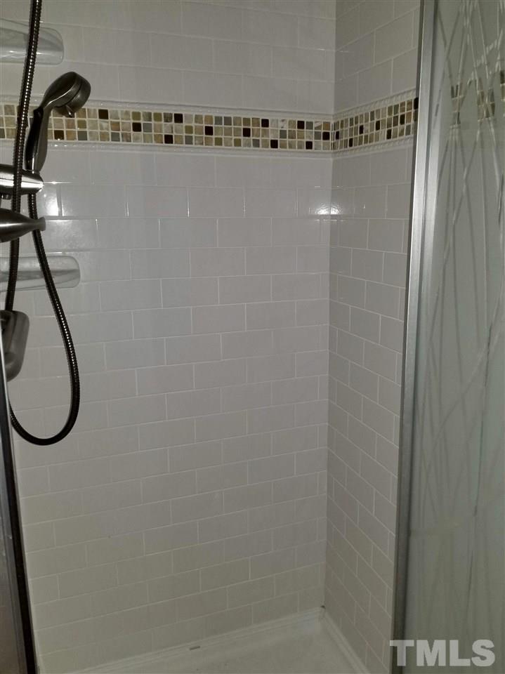 6420 Rockrest Court Raleigh, NC 27612 - Photo 10 of 22 Updated stand-up shower in master bathroom