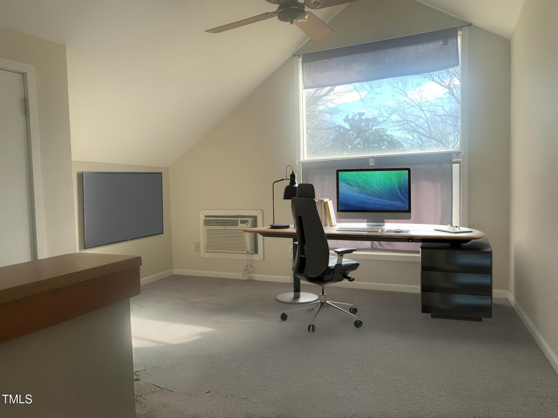 943 St Marys Street, Unit B Raleigh, NC 27605 - Photo 15 of 15 a view of workspace with flat screen tv