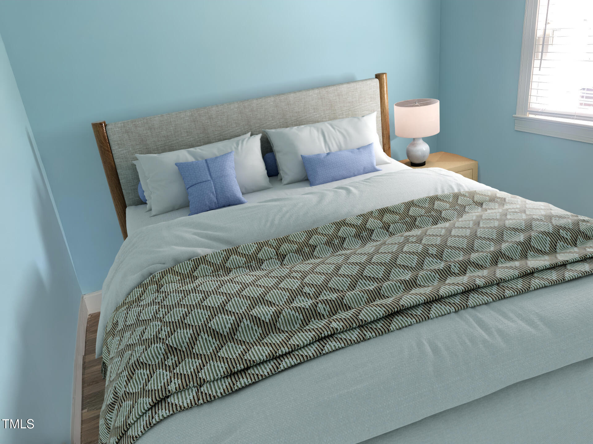 943 St Marys Street, Unit B Raleigh, NC 27605 - Photo 8 of 15 a large bed sitting in a bedroom next to a window