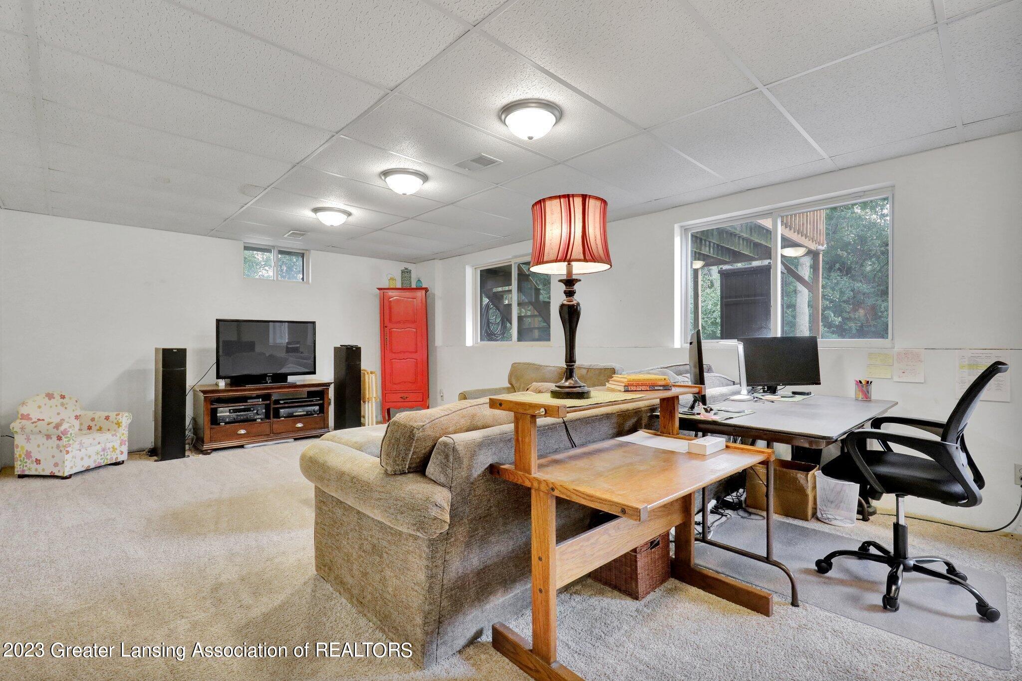 5975 Horstmeyer Road Lansing, MI 48911 - Photo 27 of 43 basement living