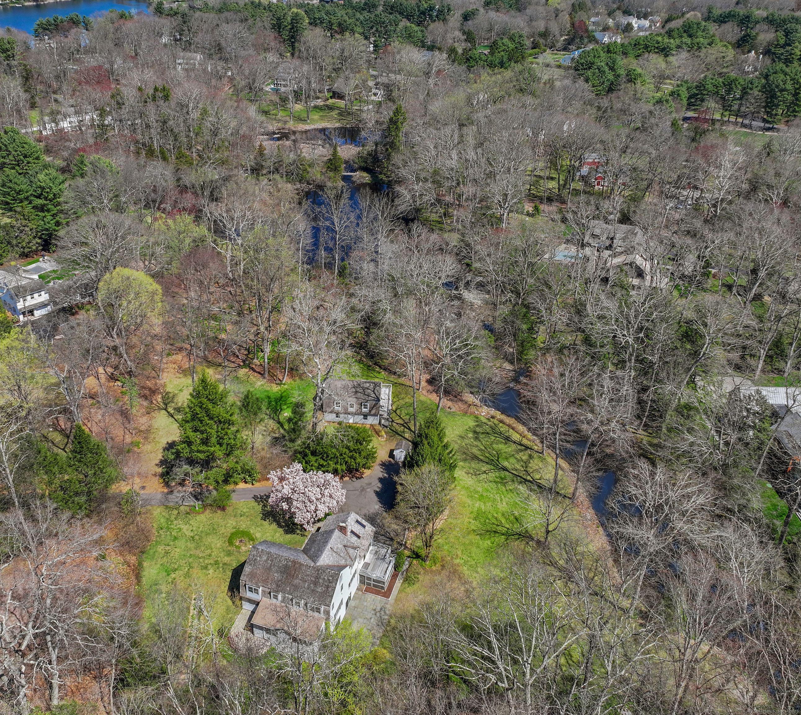 48 Cavalry Road Weston, CT 06883 - Photo 1 of 1 an aerial view of residential house with outdoor space