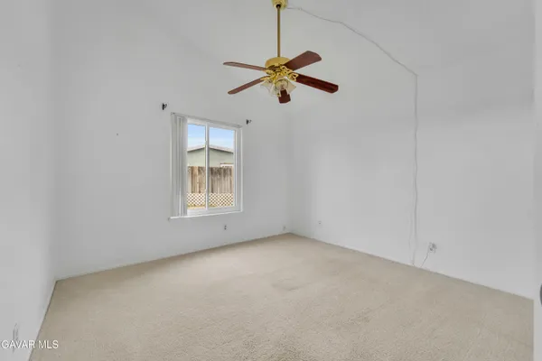 a house view with a backyard space