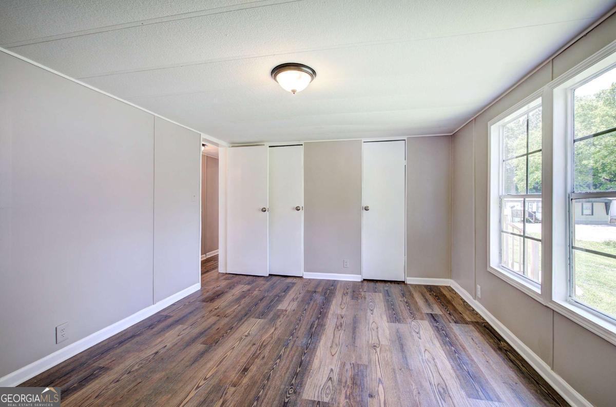 50 Tency Lane Northeast Rome, GA 30165 - Photo 13 of 23 a view of room with window and wooden floor