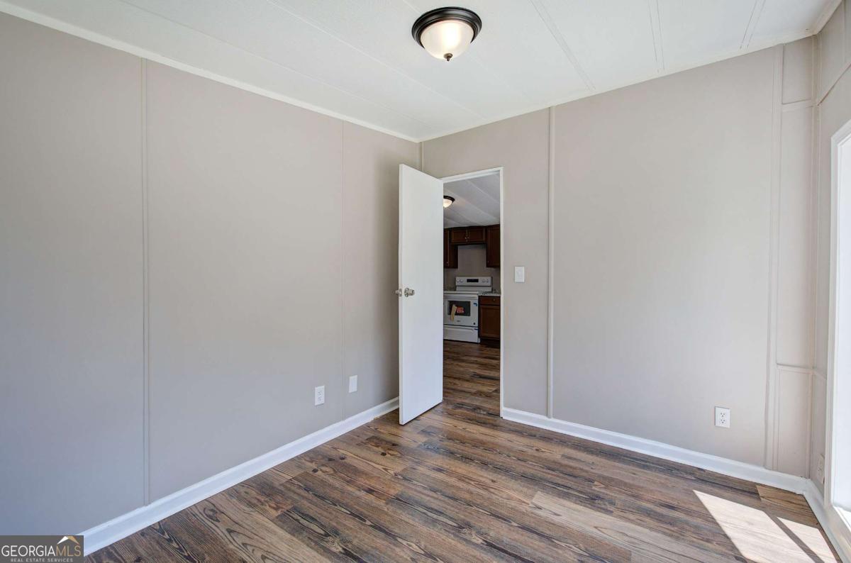 50 Tency Lane Northeast Rome, GA 30165 - Photo 5 of 23 wooden floor in an empty room