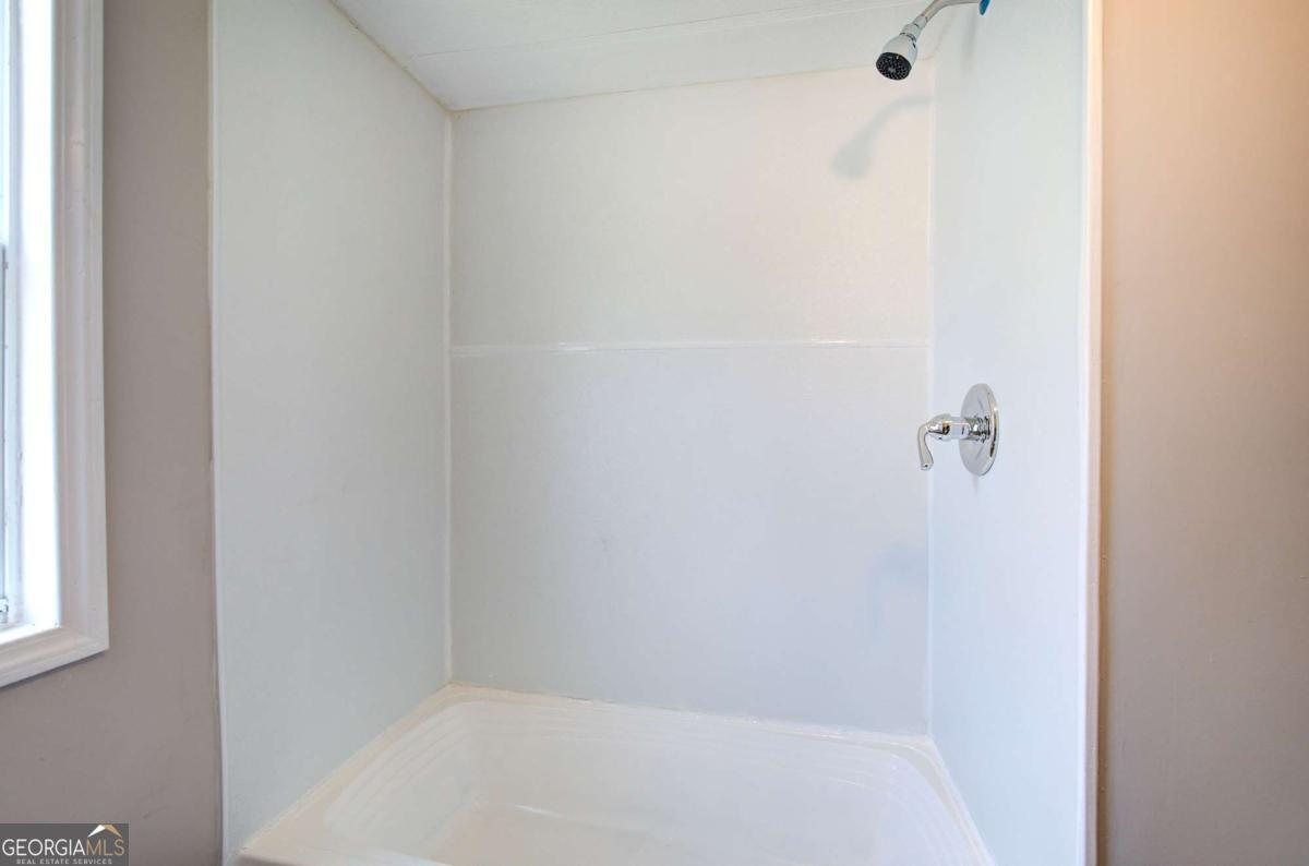 50 Tency Lane Northeast Rome, GA 30165 - Photo 7 of 23 a bathroom with a shower