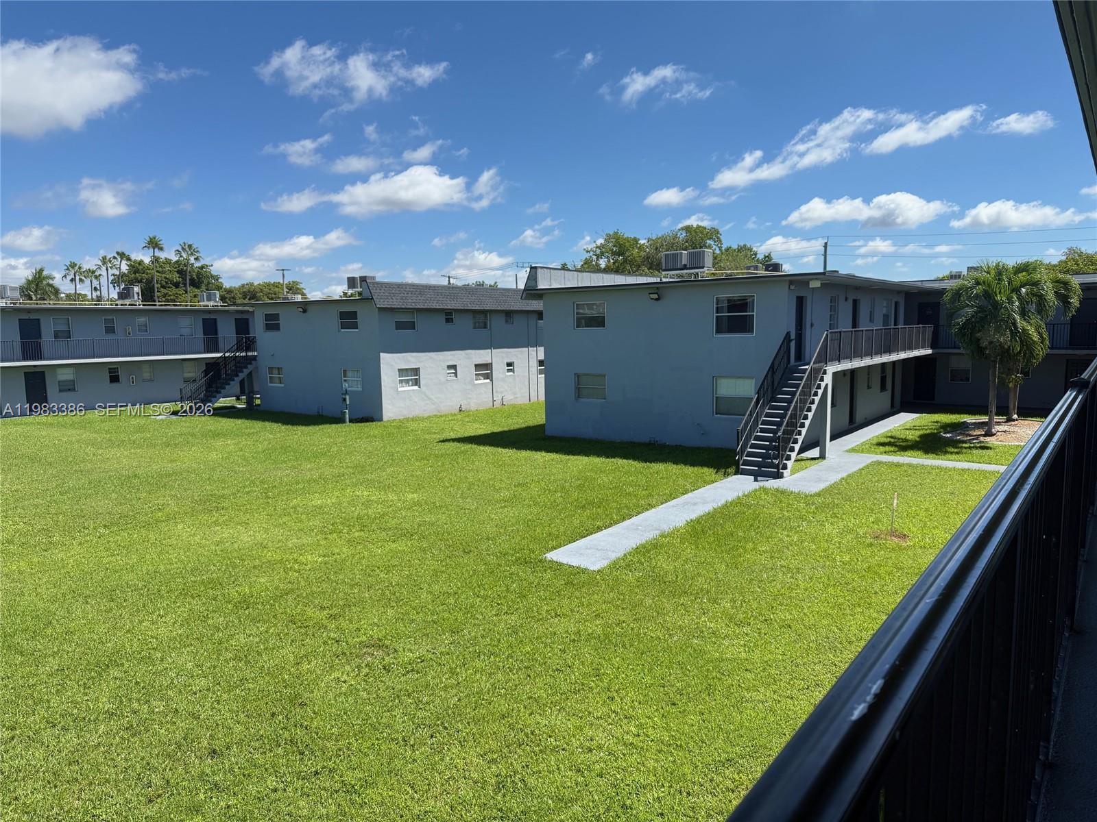 4300 Southwest 67th Avenue, Unit 38 Miami, FL 33155 - Photo 7 of 8 a view of a pool with a backyard