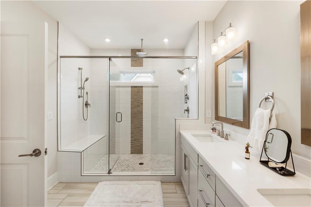 884 Mayfield Road Milton, GA 30004 - Photo 14 of 20 a bathroom with a double vanity sink mirror and shower