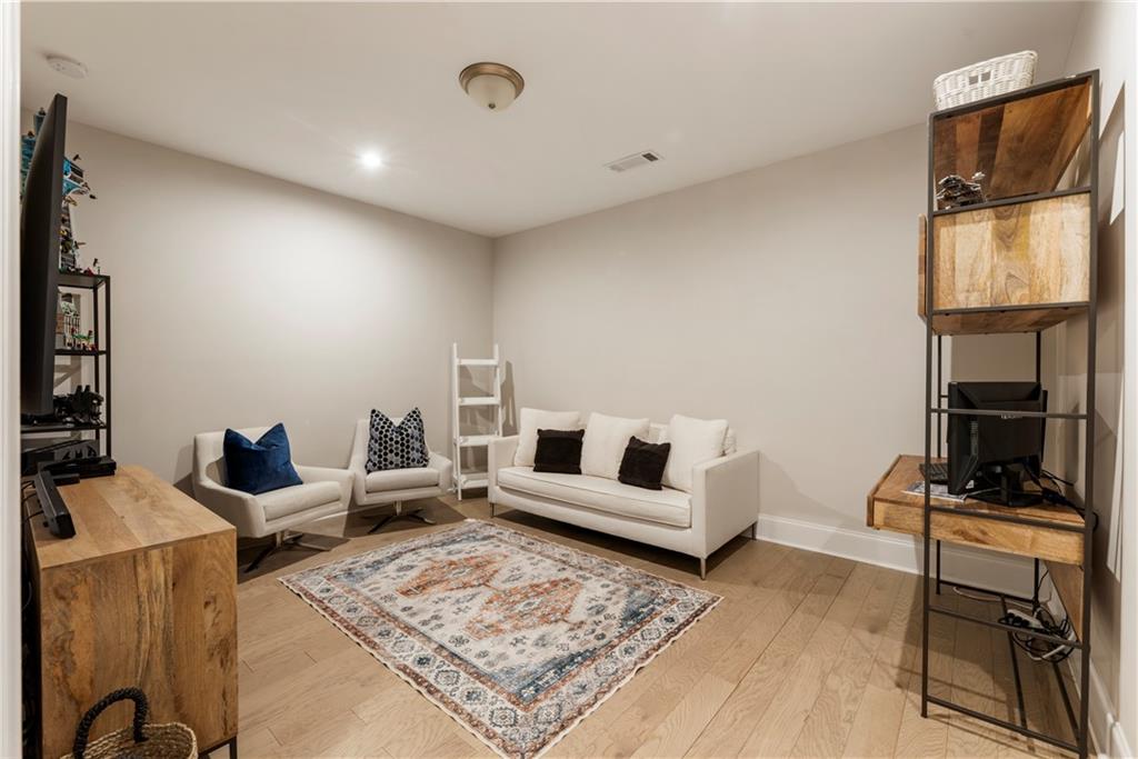 884 Mayfield Road Milton, GA 30004 - Photo 18 of 20 a living room with furniture