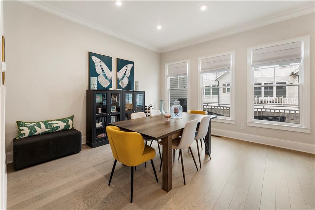 884 Mayfield Road Milton, GA 30004 - Photo 9 of 20 a view of a dining room with furniture window and wooden floor