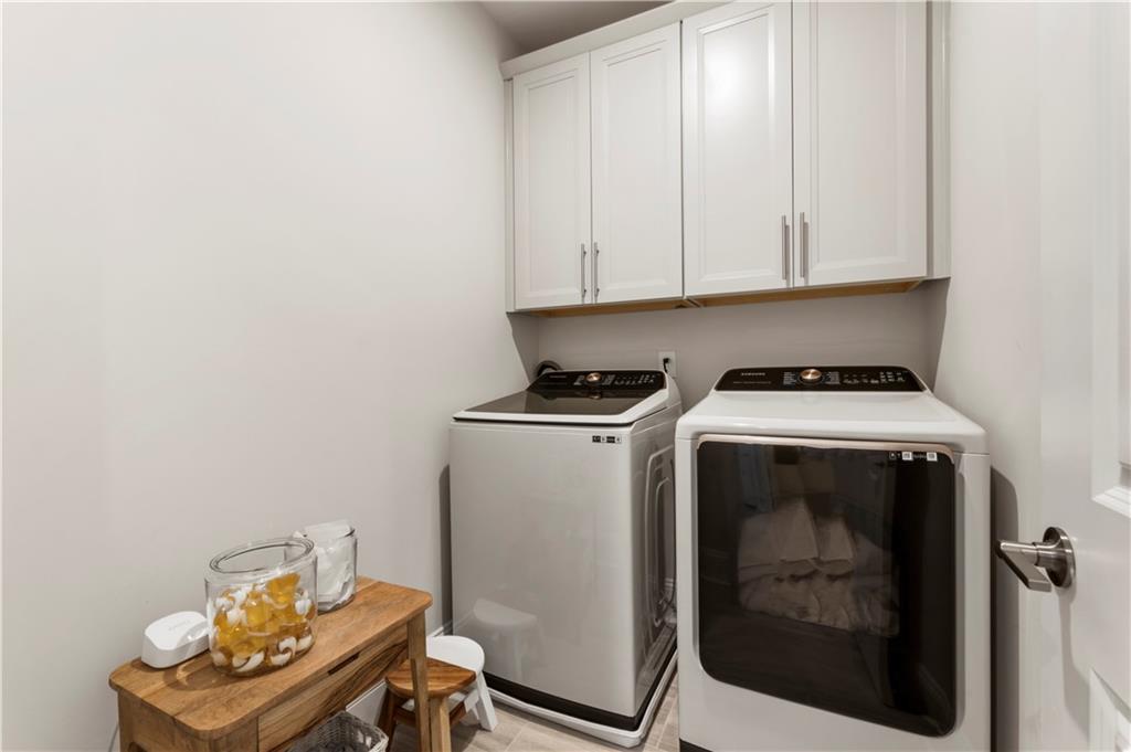 884 Mayfield Road Milton, GA 30004 - Photo 10 of 20 a utility room with dryer and washer