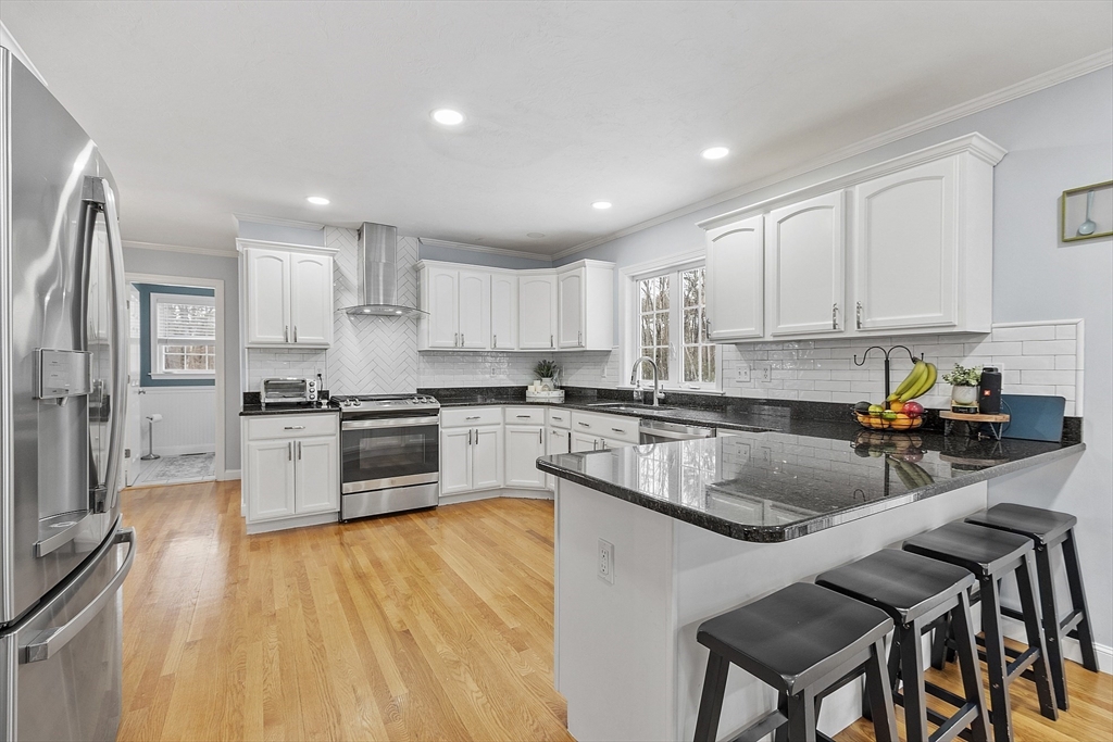 2 Gabes Place Lunenburg, MA 01462 - Photo 11 of 41 a kitchen with a sink a counter top space stainless steel appliances and cabinets