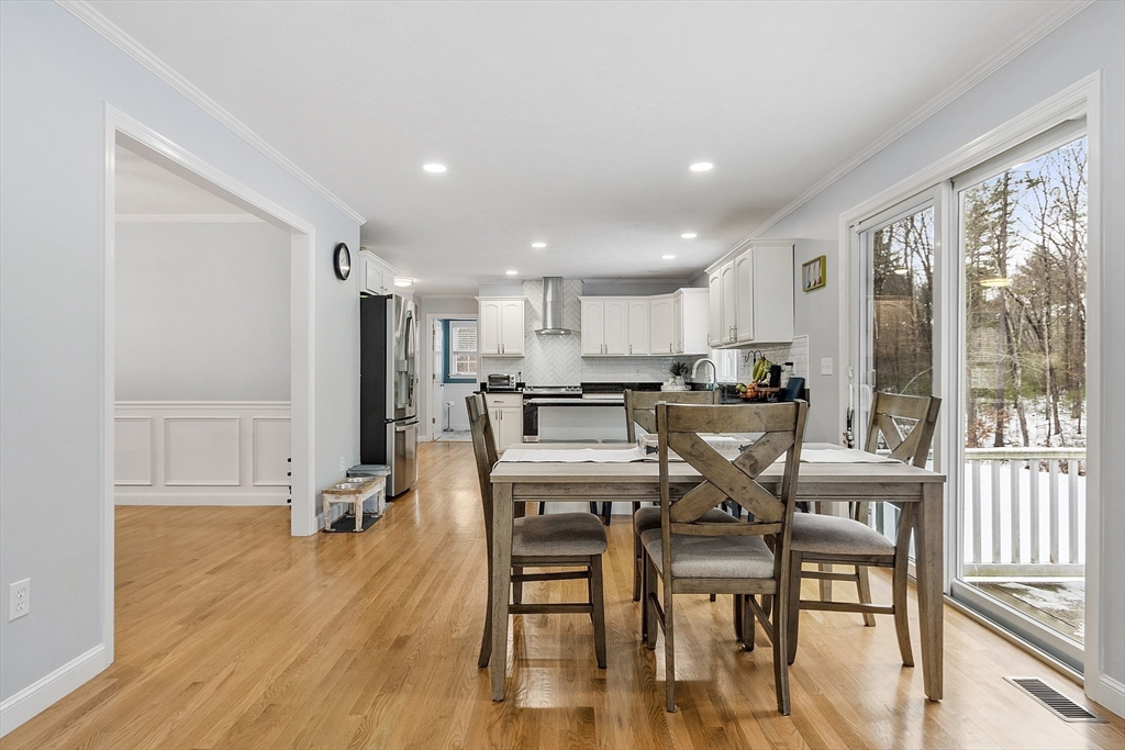 2 Gabes Place Lunenburg, MA 01462 - Photo 14 of 41 a view of a dining room with furniture window and wooden floor