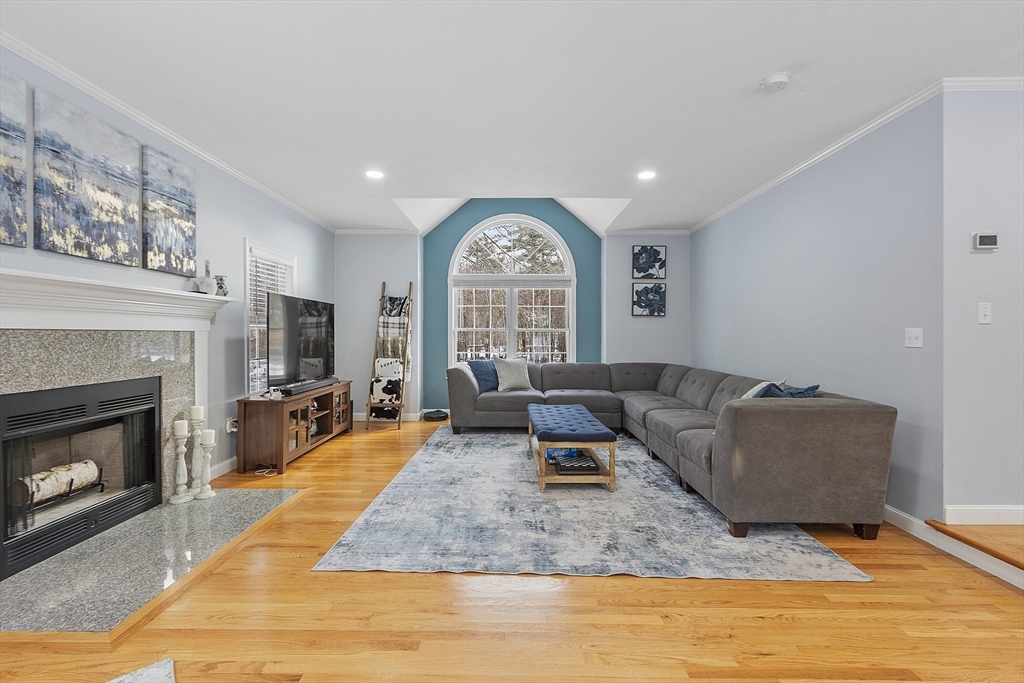 2 Gabes Place Lunenburg, MA 01462 - Photo 16 of 41 a living room with furniture and a fireplace