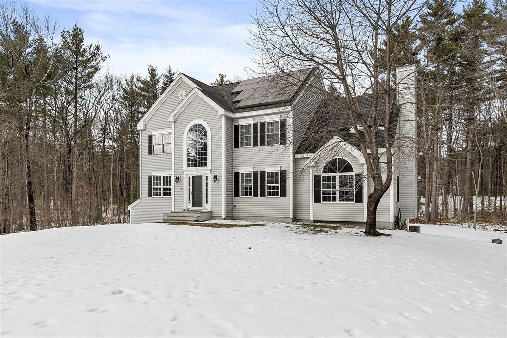 2 Gabes Place Lunenburg, MA 01462 - Photo 2 of 41 a view of a white house with a yard covered in snow