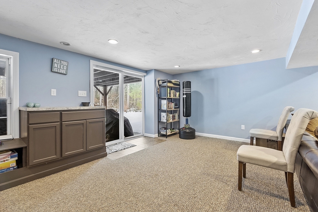 2 Gabes Place Lunenburg, MA 01462 - Photo 39 of 41 a view of a livingroom with furniture and staircase
