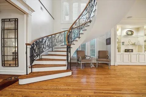 a bathroom with a shower and a mirror