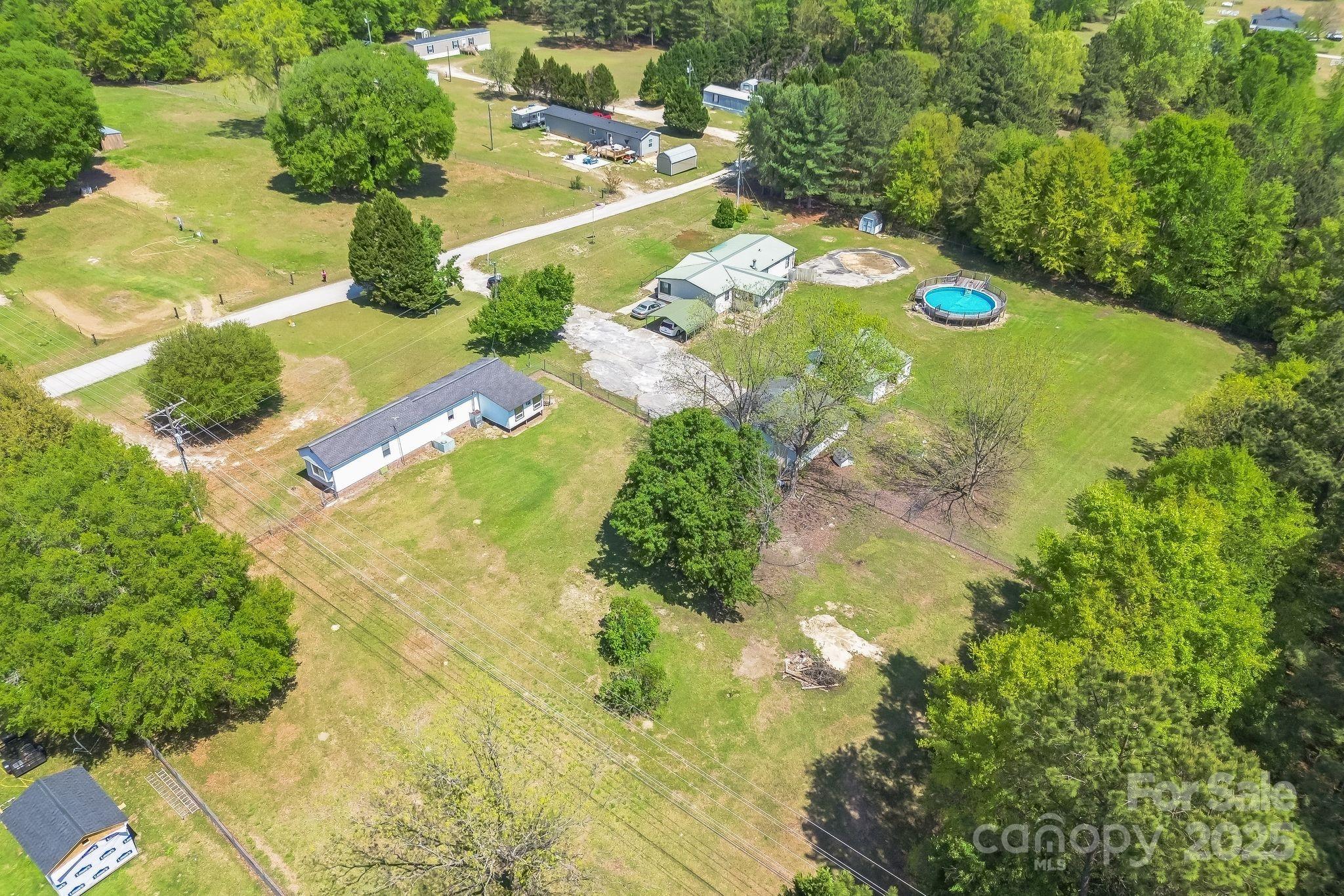 164 Phelps Road Chesterfield, SC 29709 - Photo 17 of 27 a view of a yard with plants