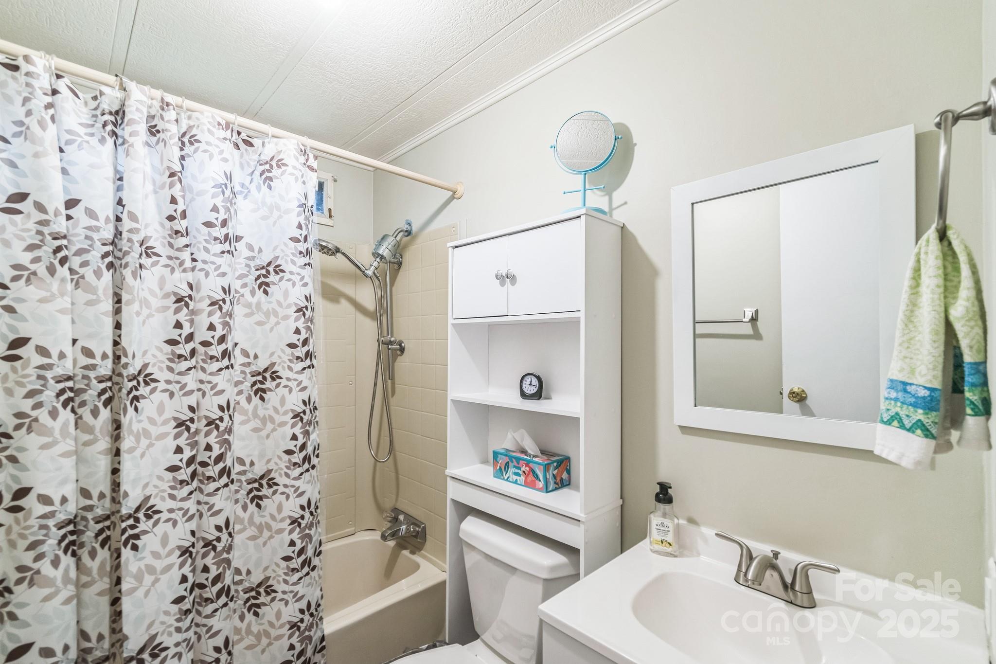 164 Phelps Road Chesterfield, SC 29709 - Photo 7 of 27 a bathroom with a sink and a mirror