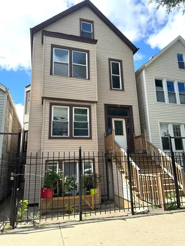 a front view of a house with a porch