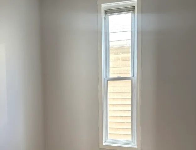 a view of a room that has a window