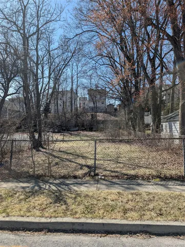 a view of a yard with an outdoor space